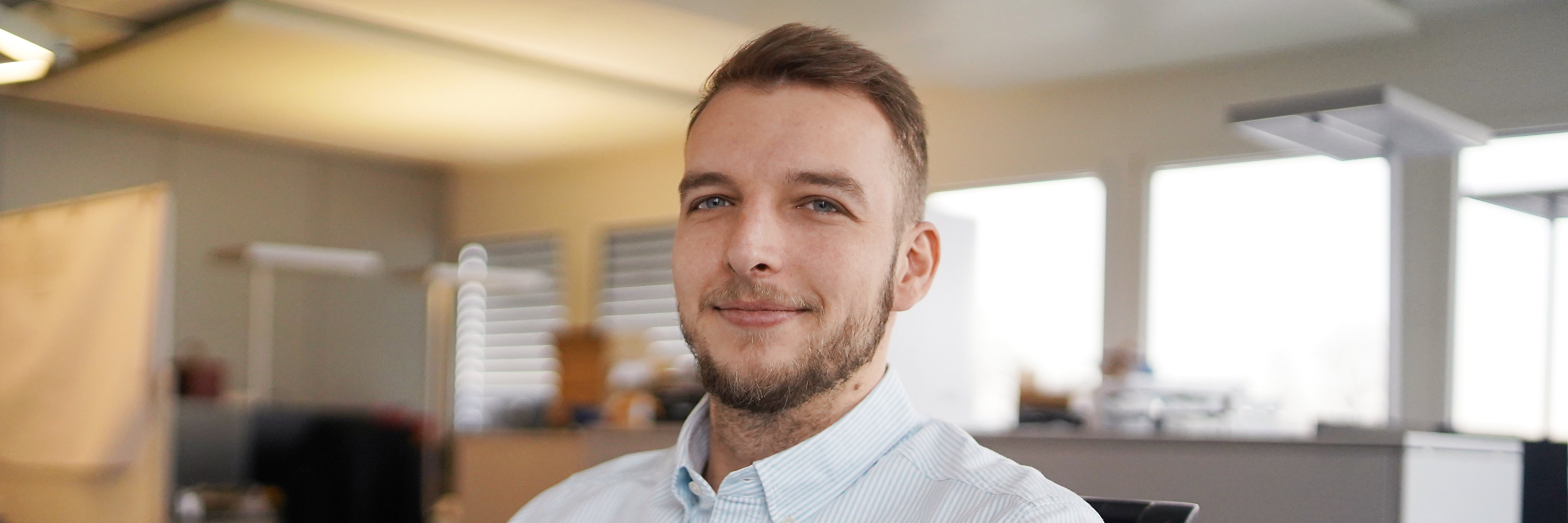 Portraitfoto von Alex, System Engineer