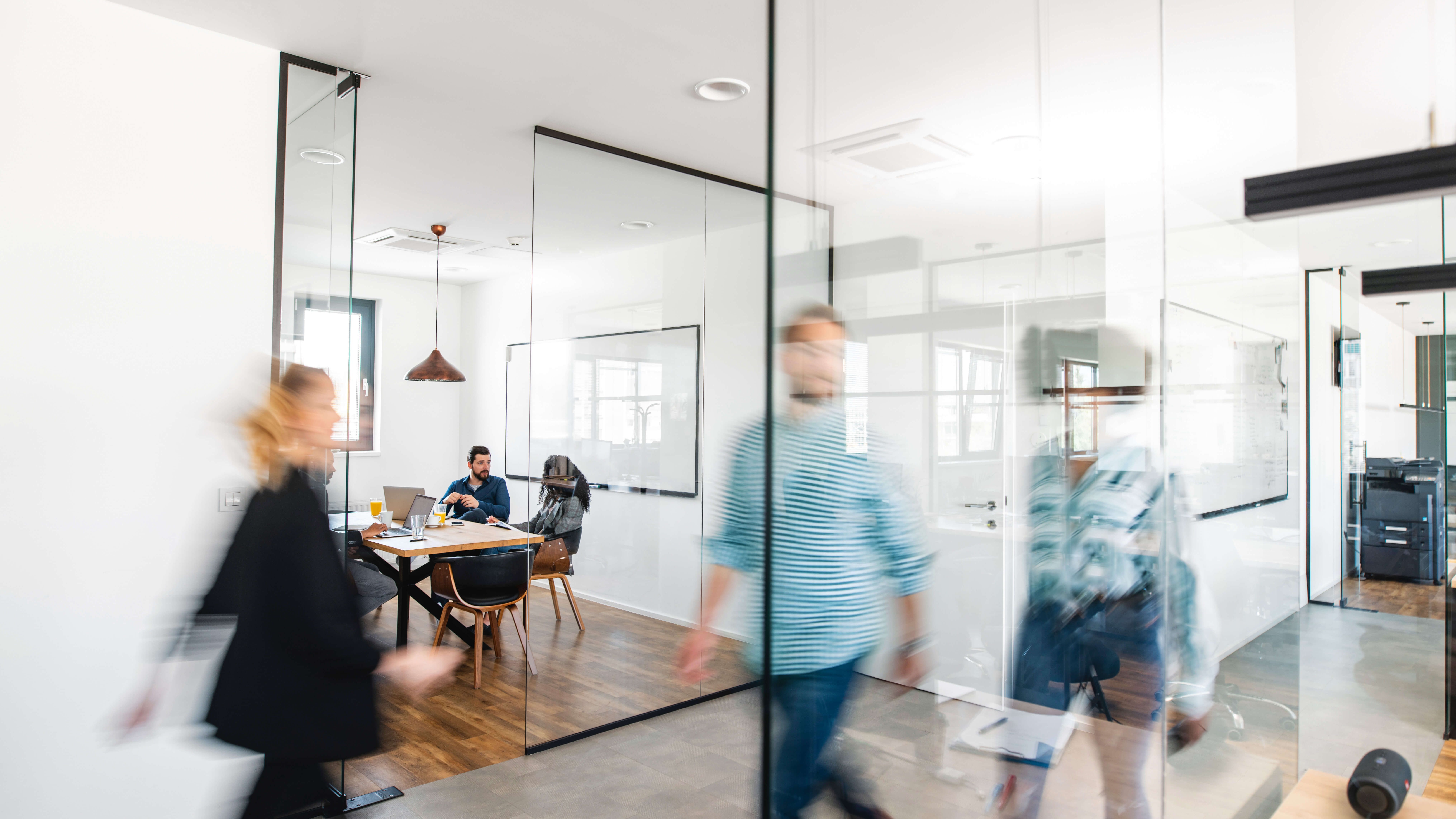 Peope walking in offices