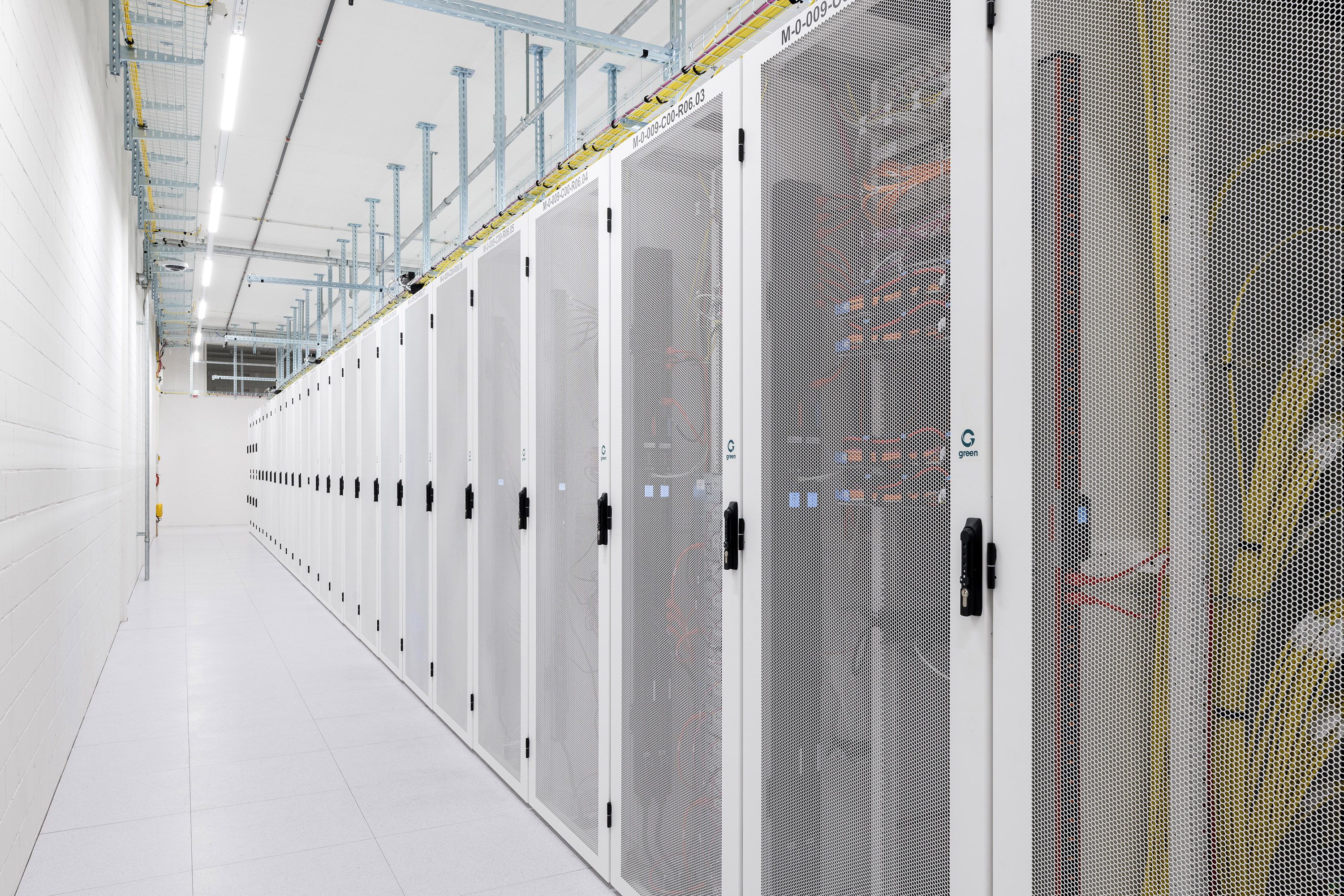 Green data center aisle with racks