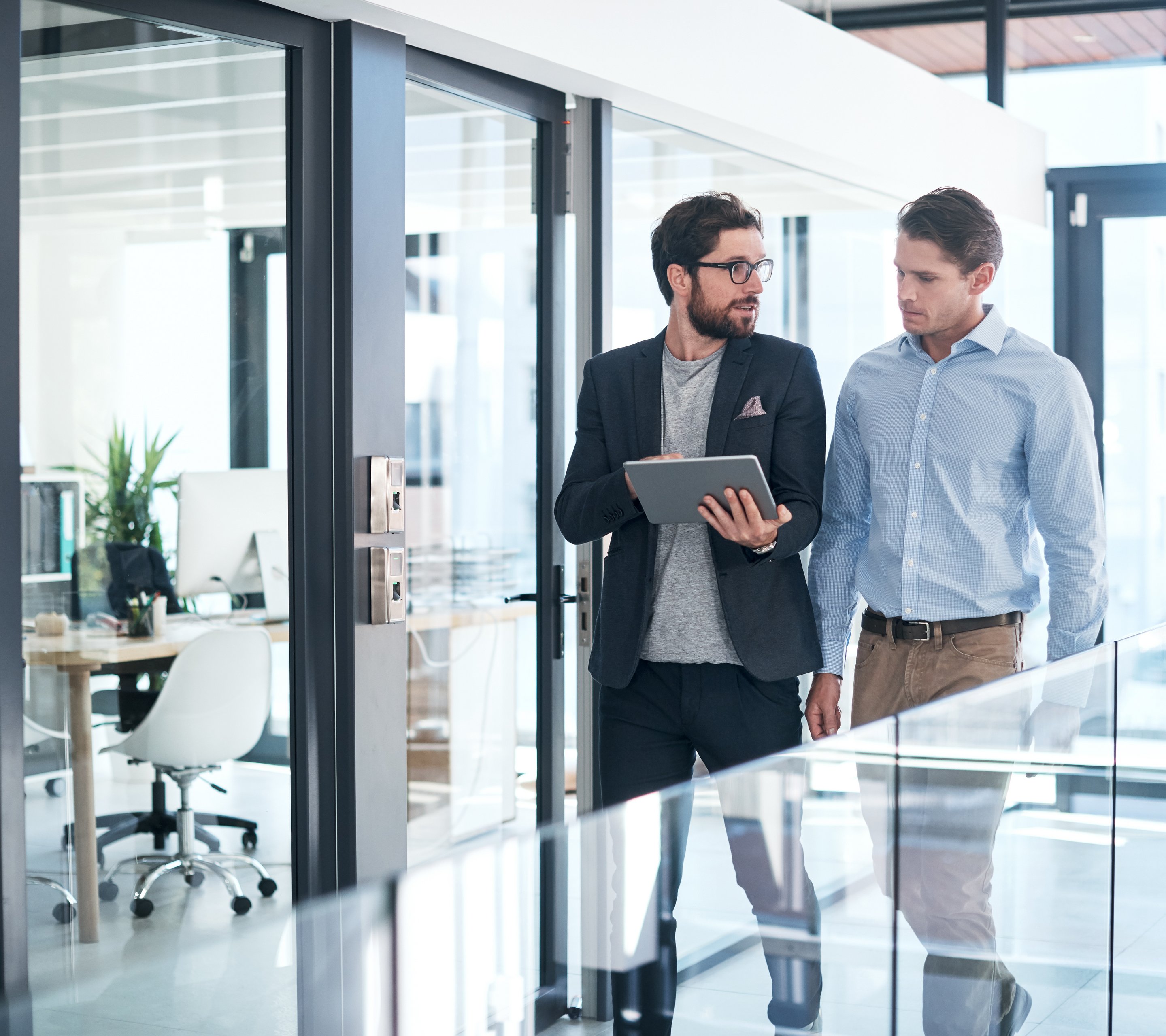 Two men discussing in an office