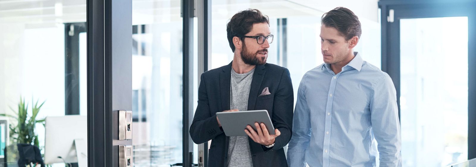 Two men discussing in an office