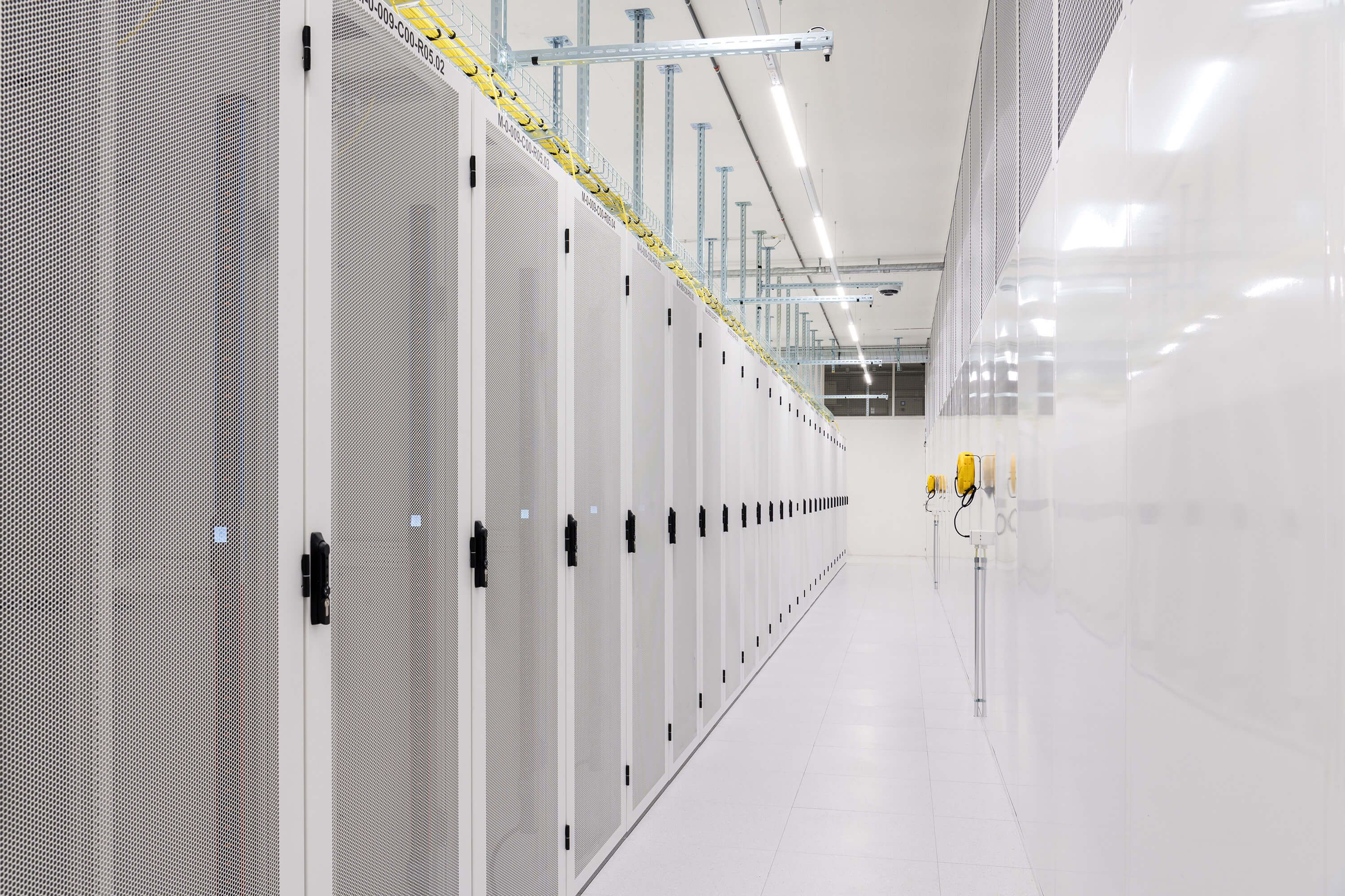 Green data center aisle with racks