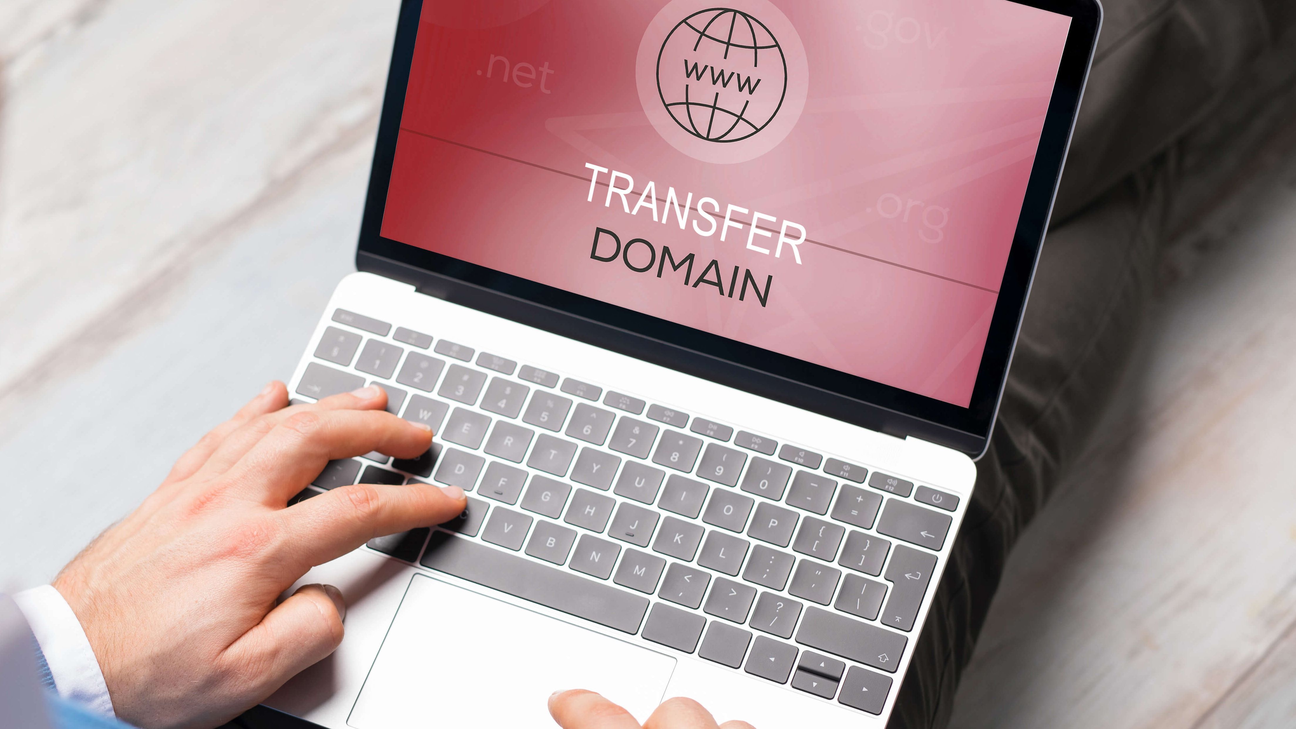 Transfer reserved website domain to Green without additional fees Man wants to transfer domain name for his website to notebook