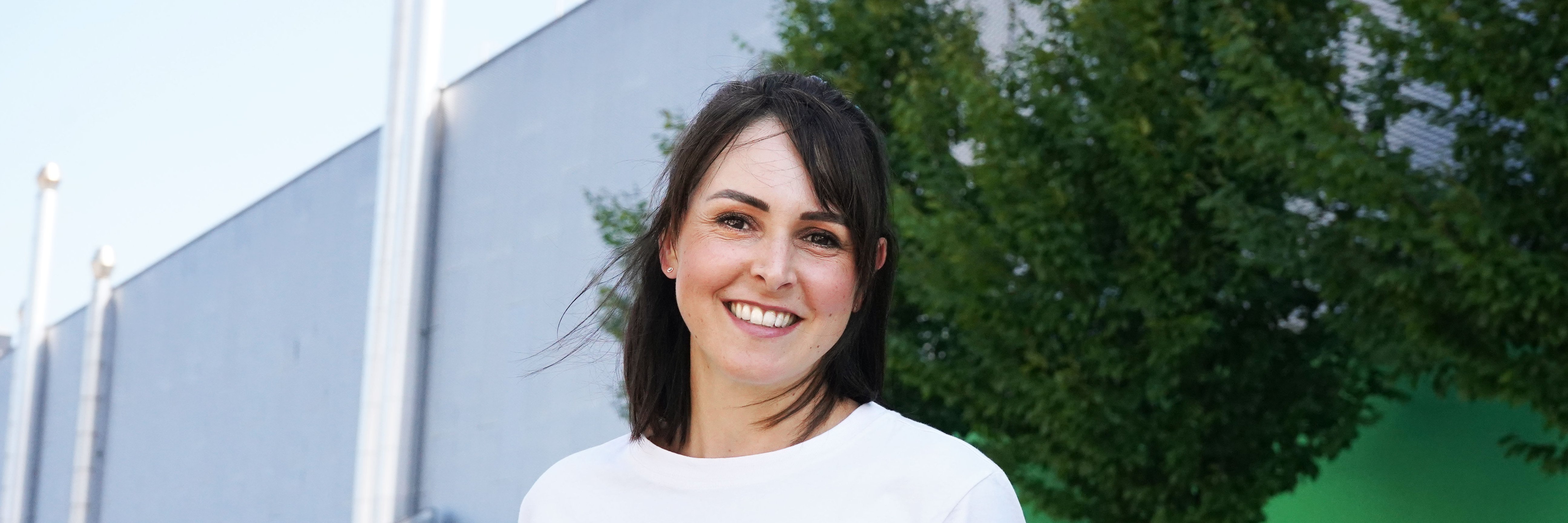 Portraitfoto von Jessica, Teamleiterin Facility Management