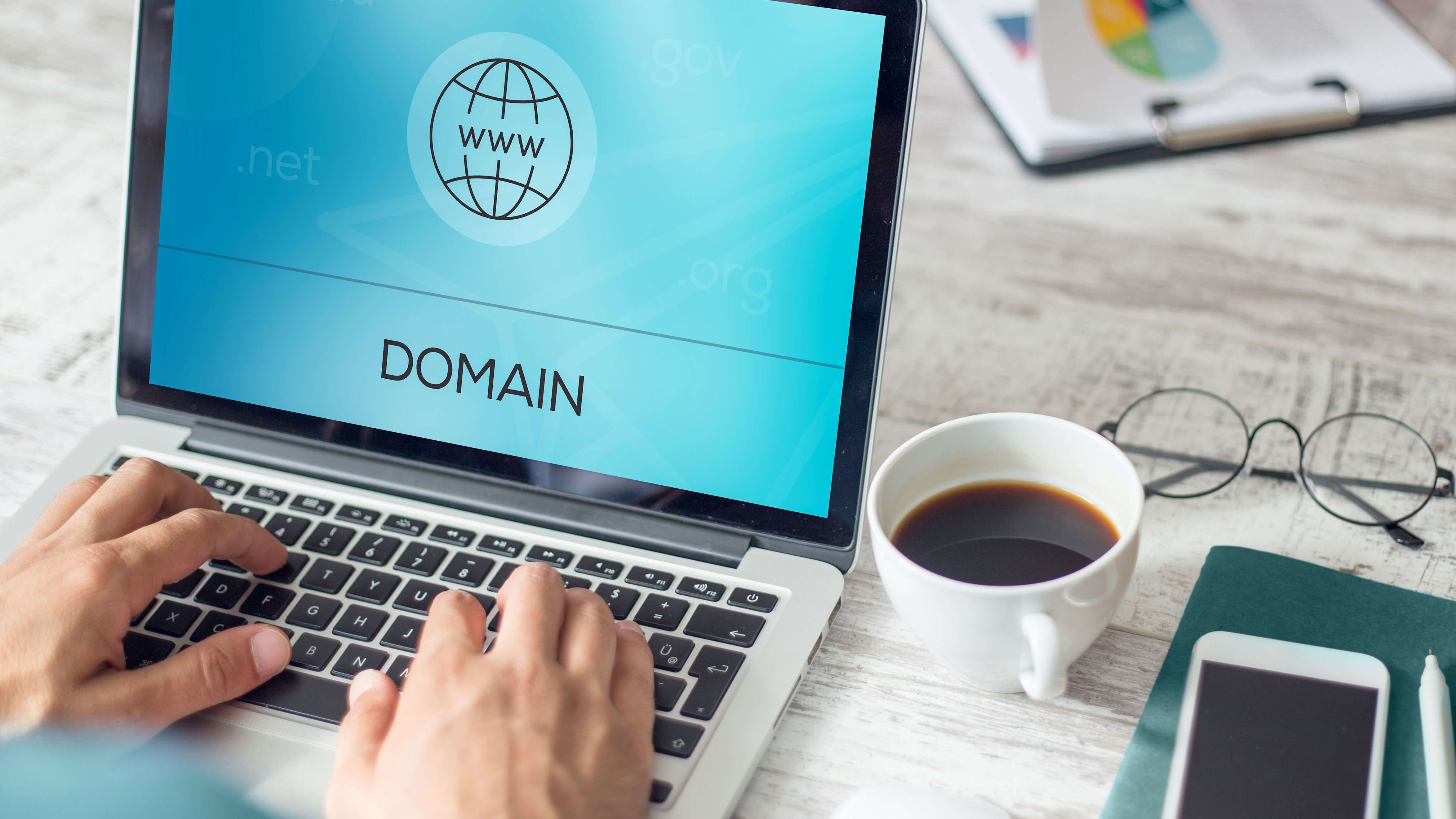 Register your domain quickly and easily with Green at fair prices Registering a domain on the laptop