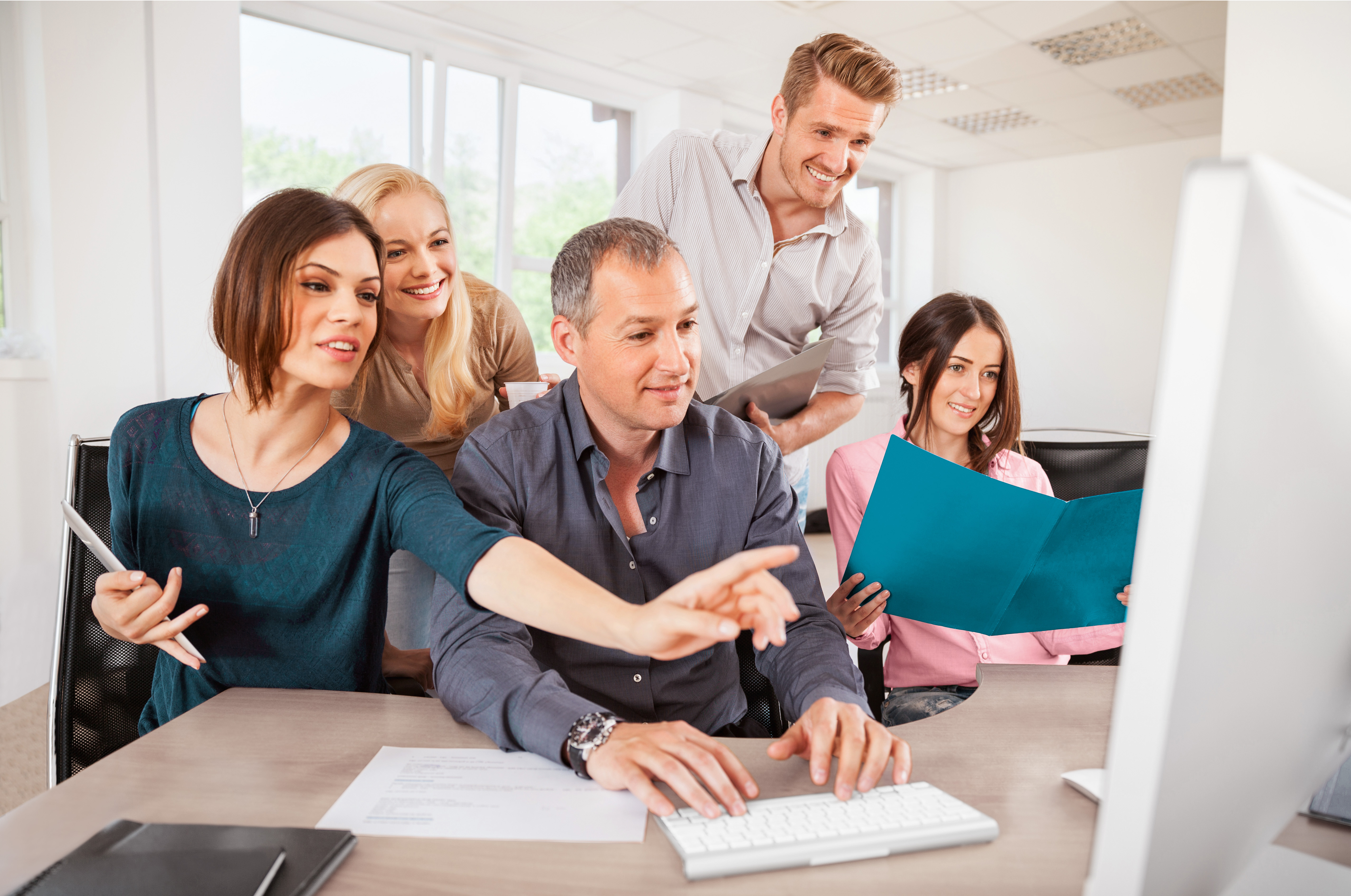 Business team builds their own website together