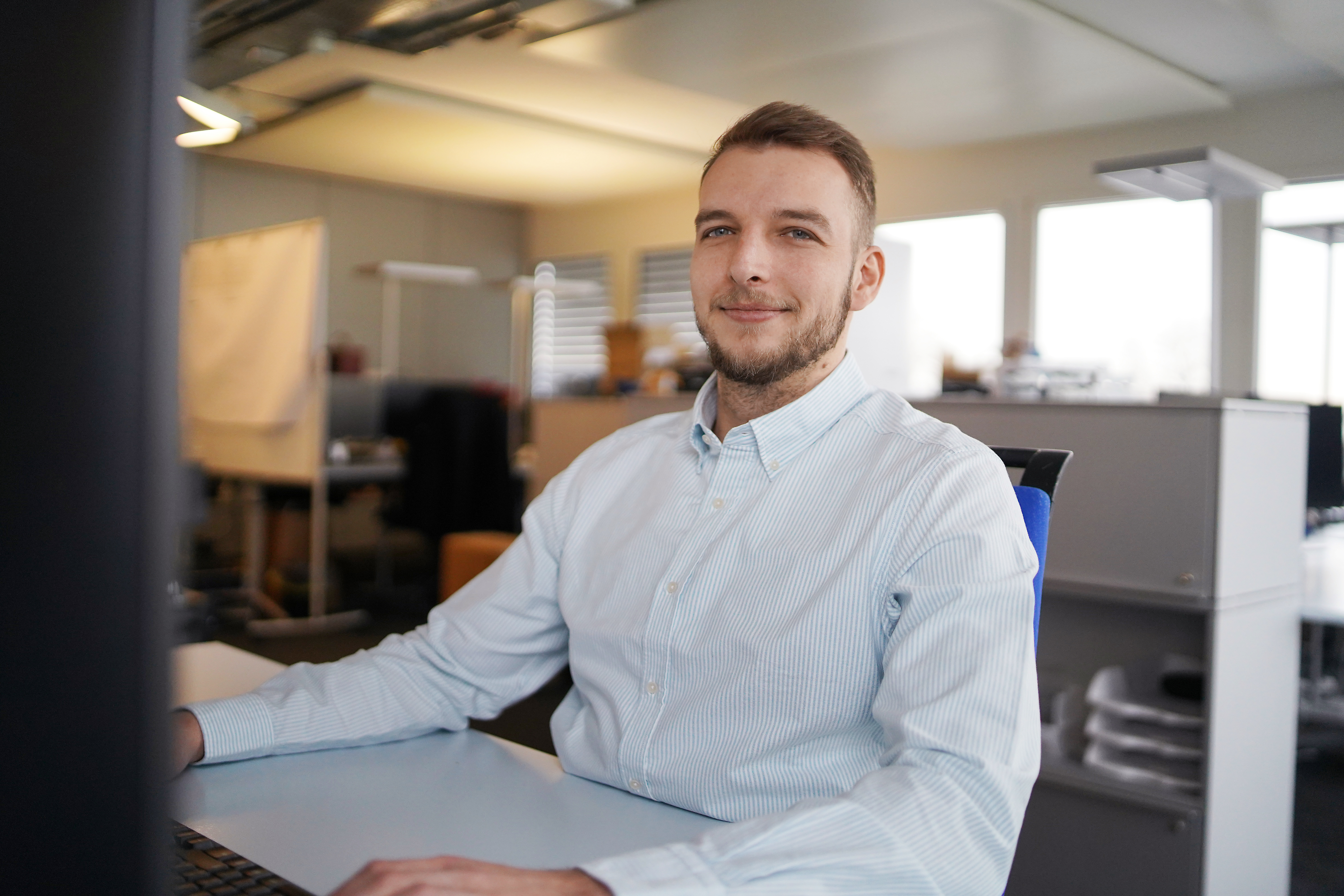 Portraitfoto von Alex, System Engineer